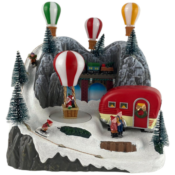 Escena Villa Navideña Globos Aerostaticos C/Luz  C/Mus C/Mov A/Bateria 3 23.5X16X2 cm