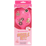 CEPILLO CON DIJES PARA EL CABELLO - ROSA FUERTE rosado